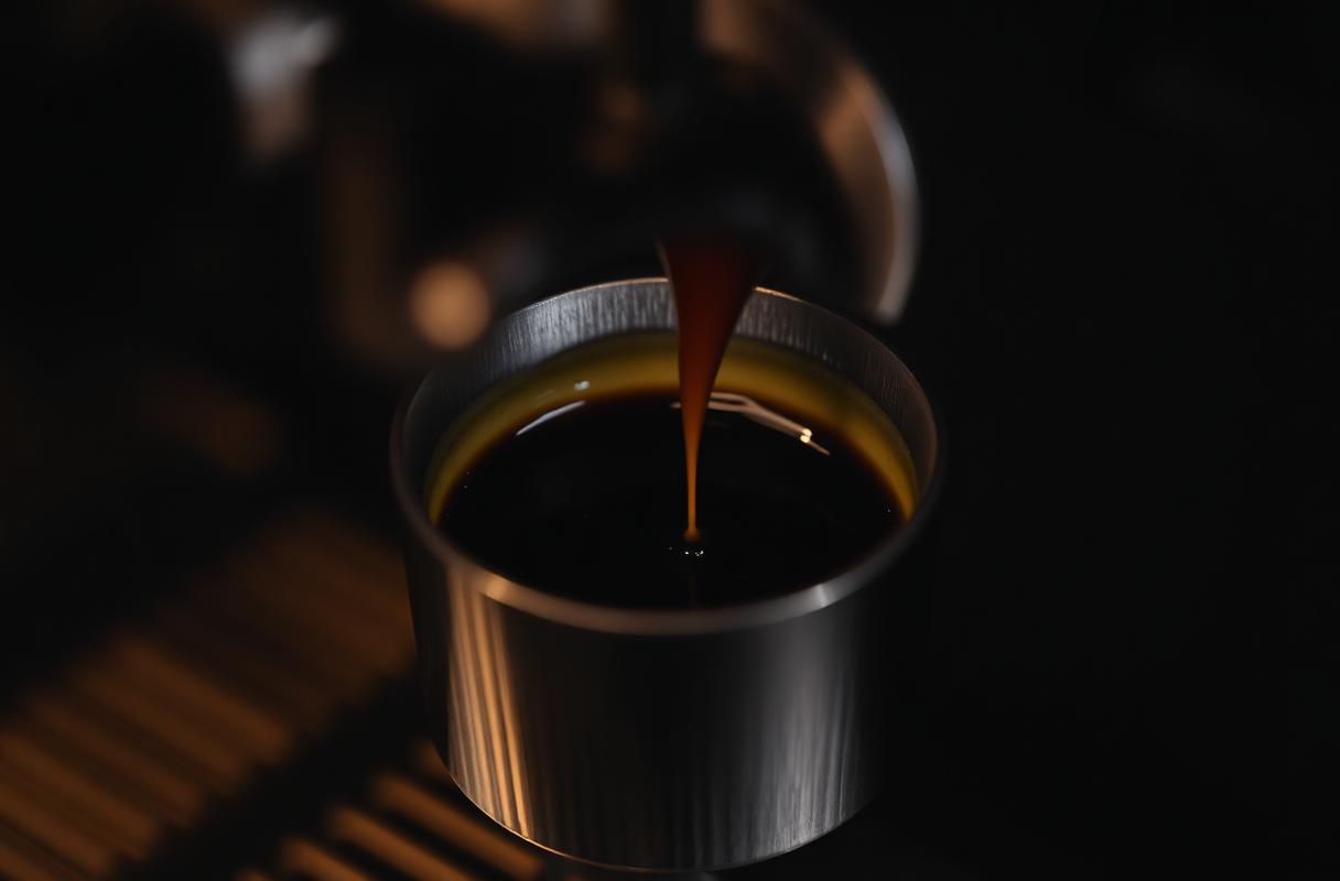 Espresso being pulled from a portafilter